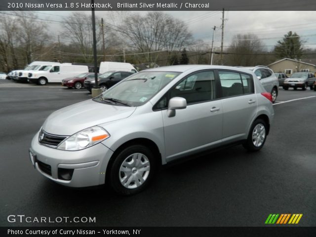 2010 Silver nissan versa hatchback #8