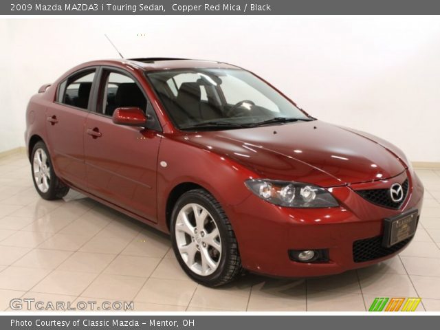 2009 Mazda MAZDA3 i Touring Sedan in Copper Red Mica