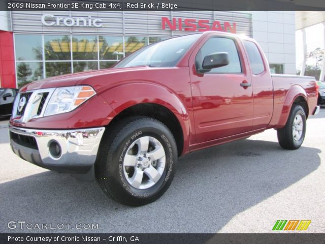 2009 Nissan Frontier SE King Cab 4x4 in Red Brick