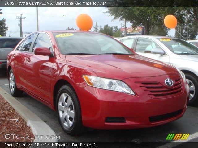 2009 Toyota Camry LE V6 in Barcelona Red Metallic