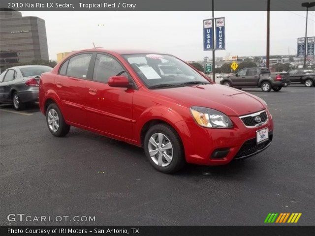 2010 Kia Rio LX Sedan in Tropical Red