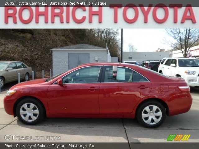 2009 Toyota Camry LE in Barcelona Red Metallic