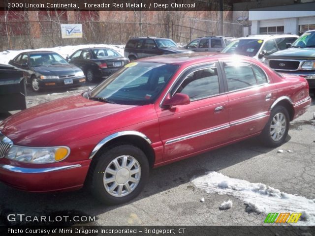 2000 Lincoln Continental  in Toreador Red Metallic