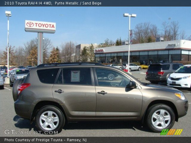 2010 Toyota RAV4 I4 4WD in Pyrite Metallic