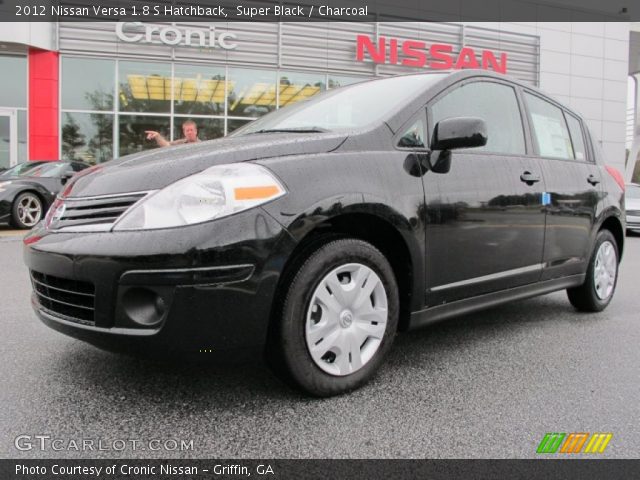 2012 Black nissan versa hatchback #4