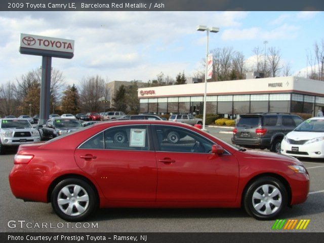 2009 Toyota Camry LE in Barcelona Red Metallic