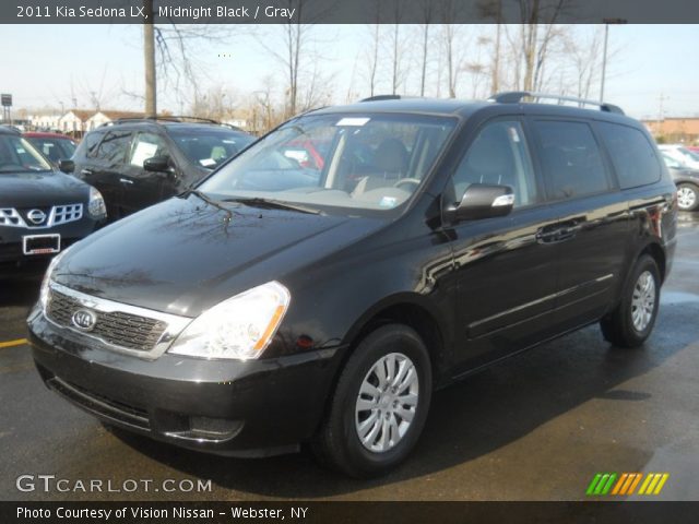 2011 Kia Sedona LX in Midnight Black