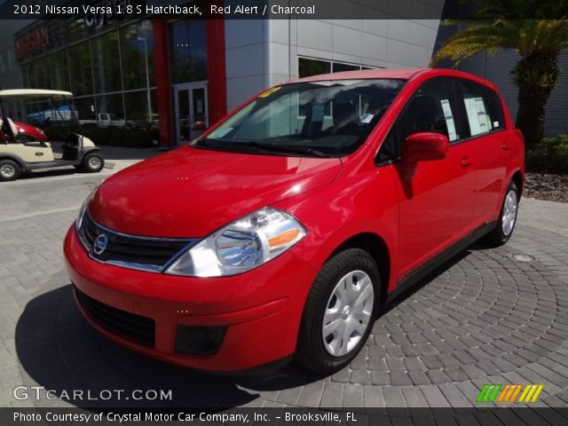 2012 Red nissan versa hatchback #5