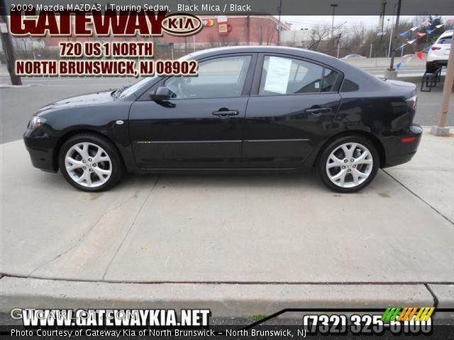 2009 Mazda MAZDA3 i Touring Sedan in Black Mica
