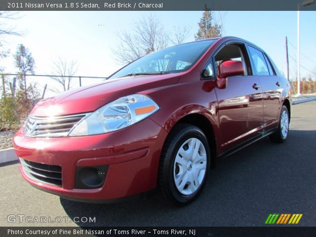 2011 Nissan Versa 1.8 S Sedan in Red Brick