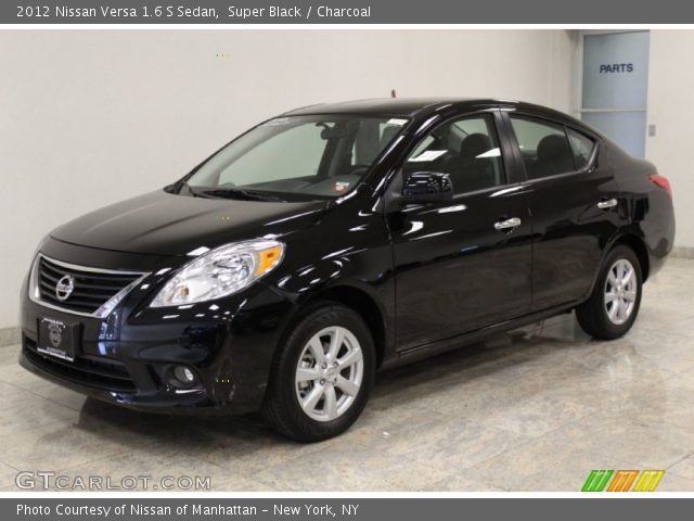 Nissan versa black sedan