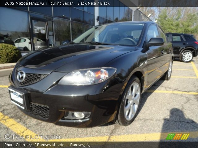2009 Mazda MAZDA3 i Touring Sedan in Black Mica