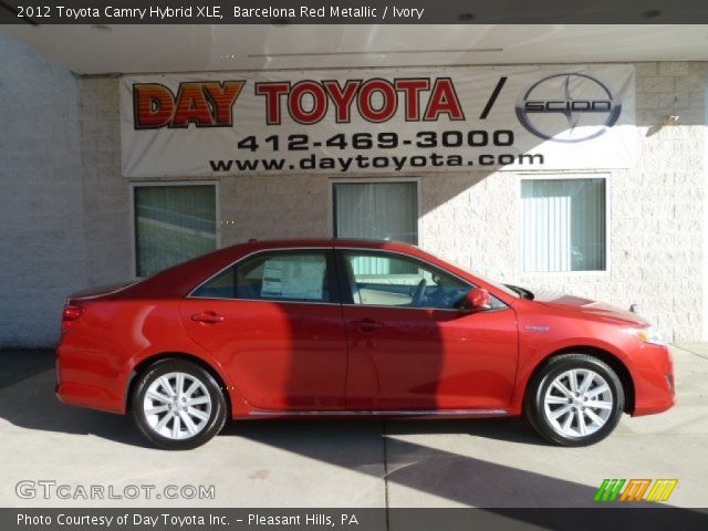 2012 Toyota Camry Hybrid XLE in Barcelona Red Metallic