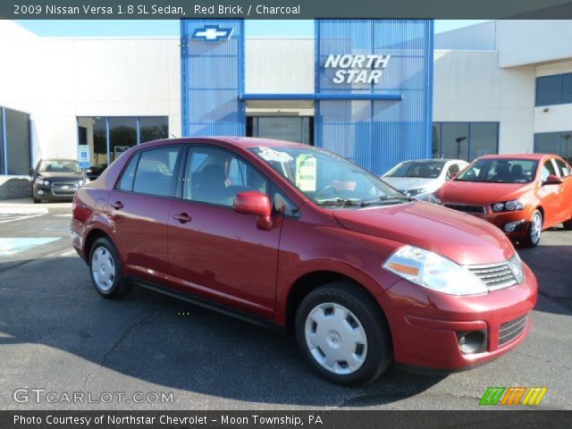 2009 Nissan Versa 1.8 SL Sedan in Red Brick