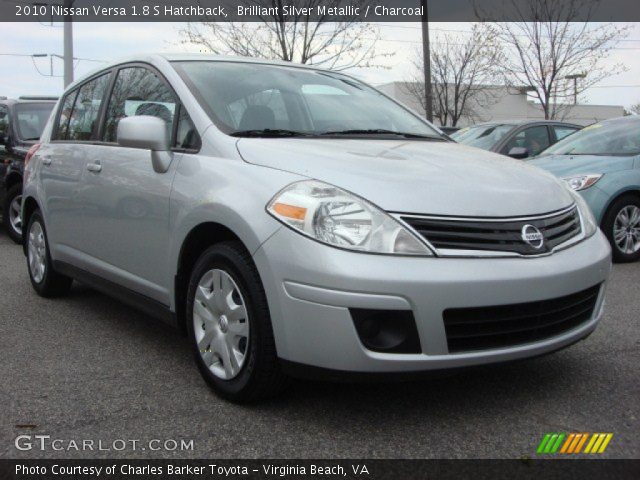 2010 Silver nissan versa hatchback #3