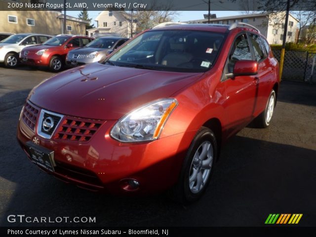 2009 Nissan Rogue SL AWD in Venom Red
