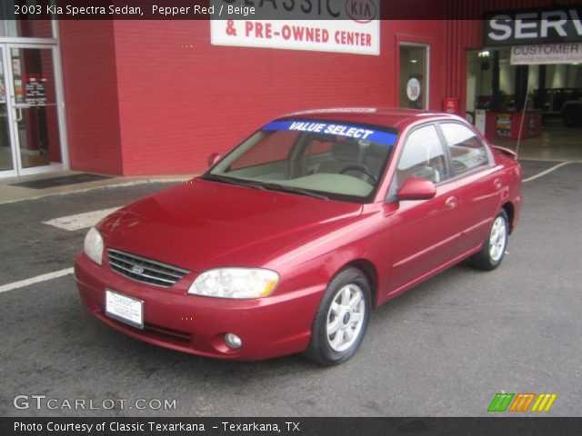 2003 Kia Spectra Sedan in Pepper Red