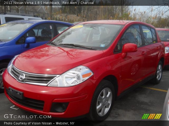 2012 Red nissan versa hatchback
