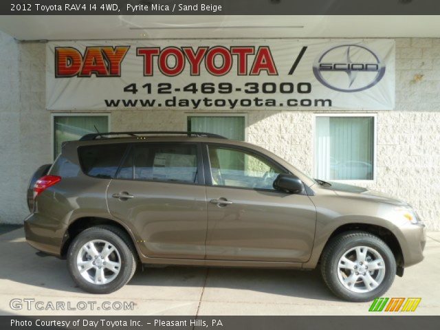 2012 Toyota RAV4 I4 4WD in Pyrite Mica