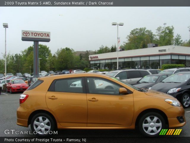2009 Toyota Matrix S AWD in Sundance Metallic