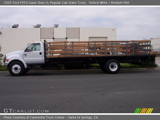 2005 Ford F650 Super Duty XL Regular Cab Stake Truck in Oxford White