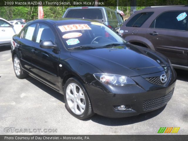 2009 Mazda MAZDA3 i Touring Sedan in Black Mica