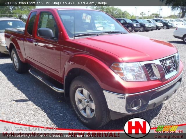 2010 Nissan Frontier SE V6 King Cab 4x4 in Red Alert