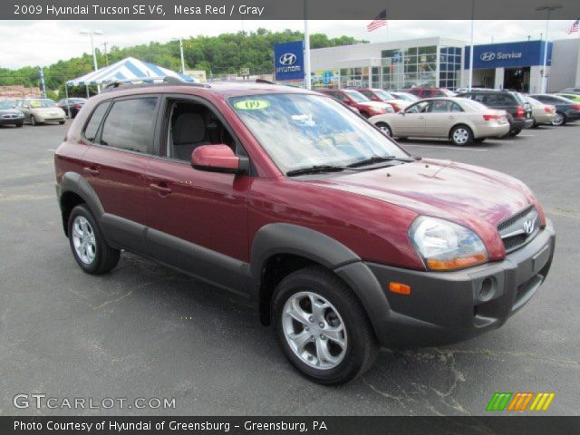 2009 Hyundai Tucson SE V6 in Mesa Red