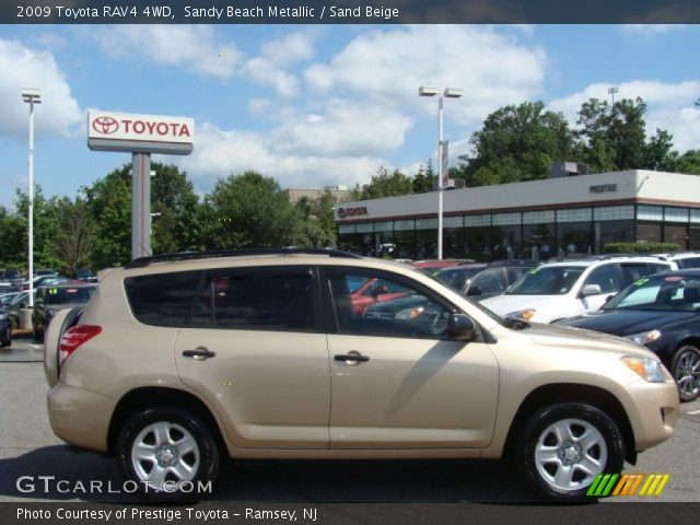 2009 Toyota RAV4 4WD in Sandy Beach Metallic