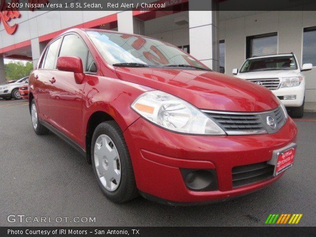 2009 Nissan Versa 1.8 SL Sedan in Red Alert