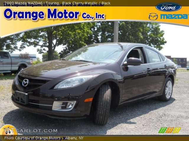 2009 Mazda MAZDA6 i Touring in Black Cherry Metallic