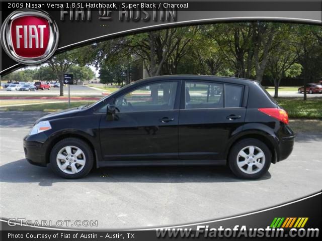 2009 Black nissan versa hatchback #2
