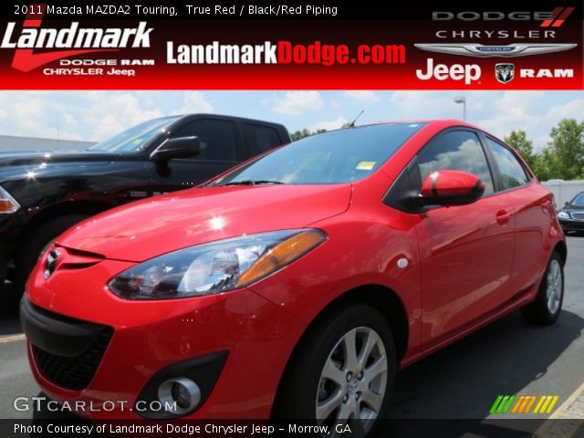 2011 Mazda MAZDA2 Touring in True Red