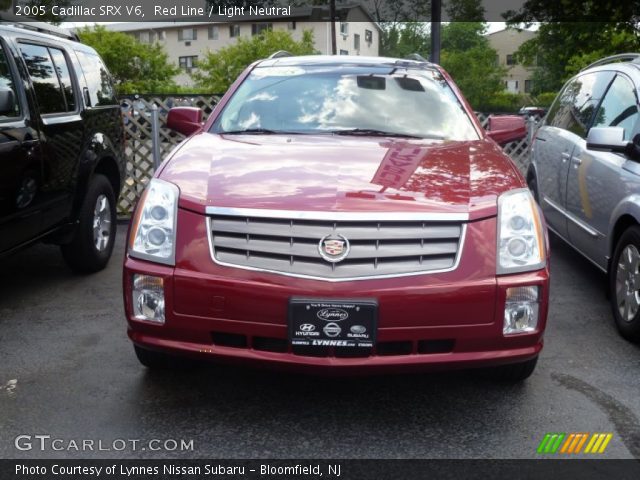 2005 Cadillac SRX V6 in Red Line