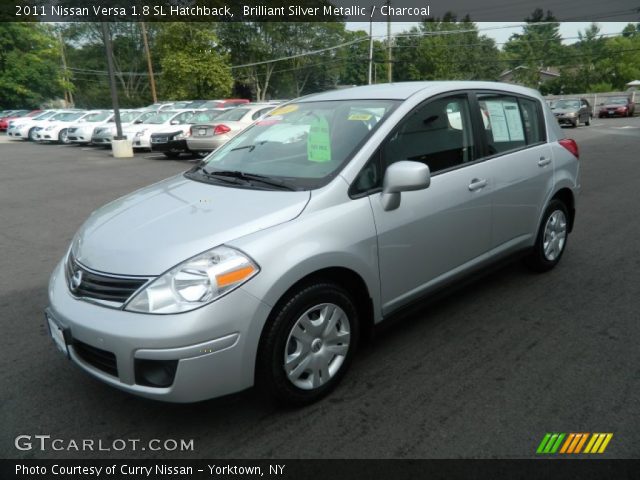 2011 Nissan versa hatchback silver #4