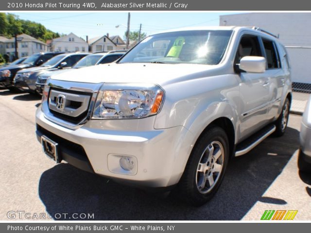 2010 Honda Pilot Touring 4WD in Alabaster Silver Metallic