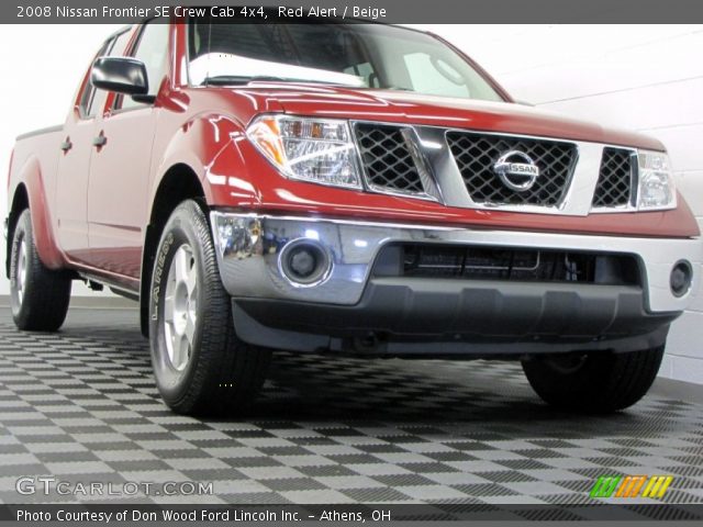2008 Nissan Frontier SE Crew Cab 4x4 in Red Alert