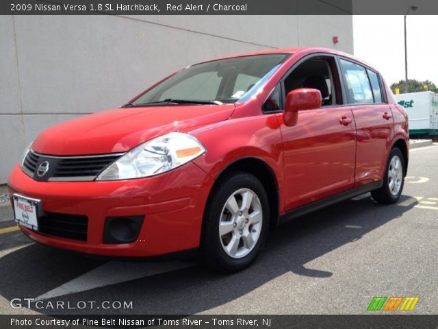 2009 Nissan Versa 1.8 SL Hatchback in Red Alert
