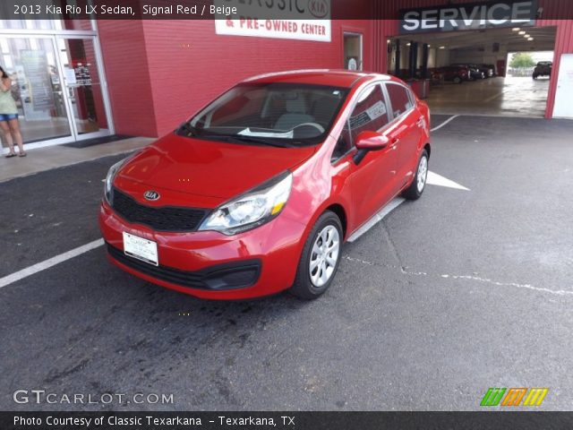 2013 Kia Rio LX Sedan in Signal Red