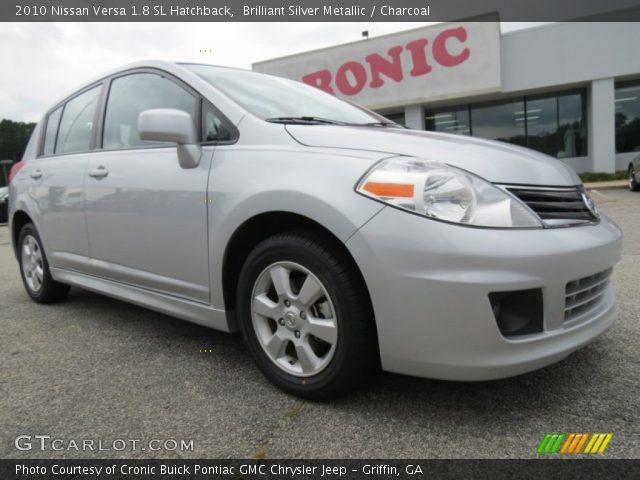 2010 Silver nissan versa hatchback #9