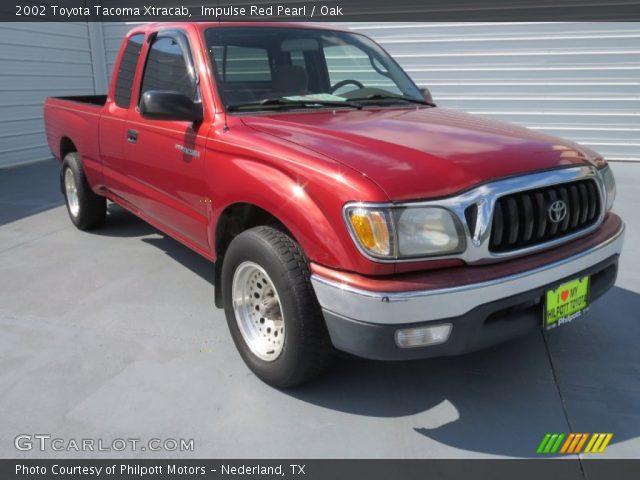 2002 Toyota Tacoma Xtracab in Impulse Red Pearl