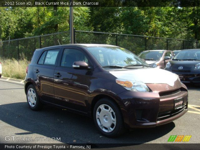 2012 Scion xD  in Black Currant Mica