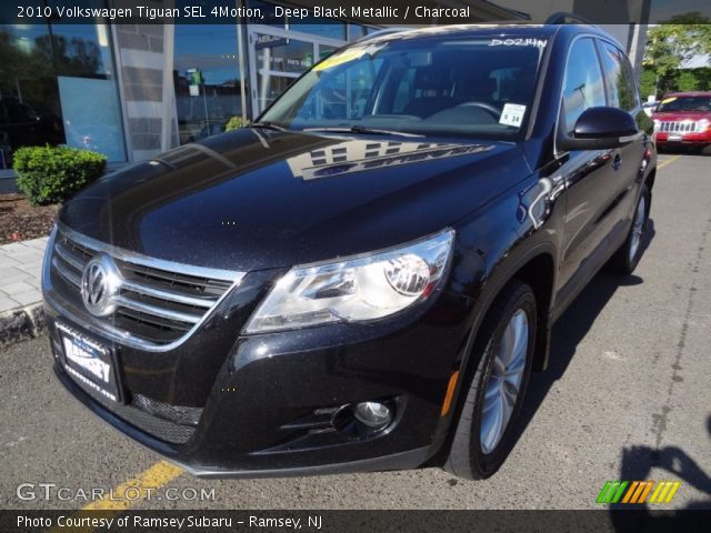 2010 Volkswagen Tiguan SEL 4Motion in Deep Black Metallic