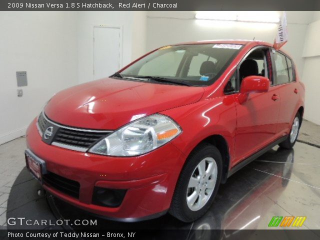 2009 Nissan Versa 1.8 S Hatchback in Red Alert