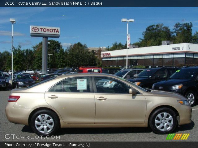 2010 Toyota Camry LE in Sandy Beach Metallic