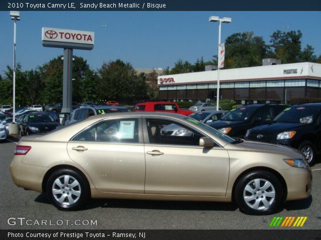 2010 Toyota Camry LE in Sandy Beach Metallic