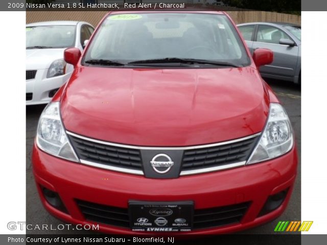 2009 Nissan Versa 1.8 SL Hatchback in Red Alert
