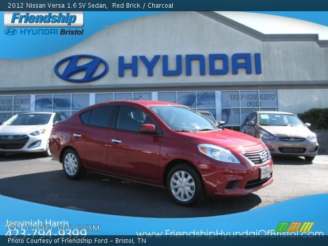 2012 Nissan Versa 1.6 SV Sedan in Red Brick