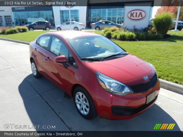 2013 Kia Rio LX Sedan in Signal Red