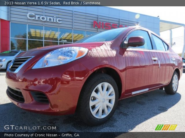 2013 Nissan Versa 1.6 SV Sedan in Red Brick